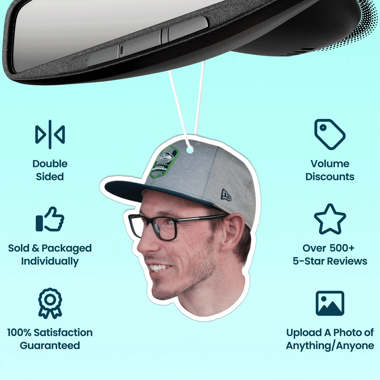 Custom photo car air fresheners in various shapes hanging from a car mirror. 